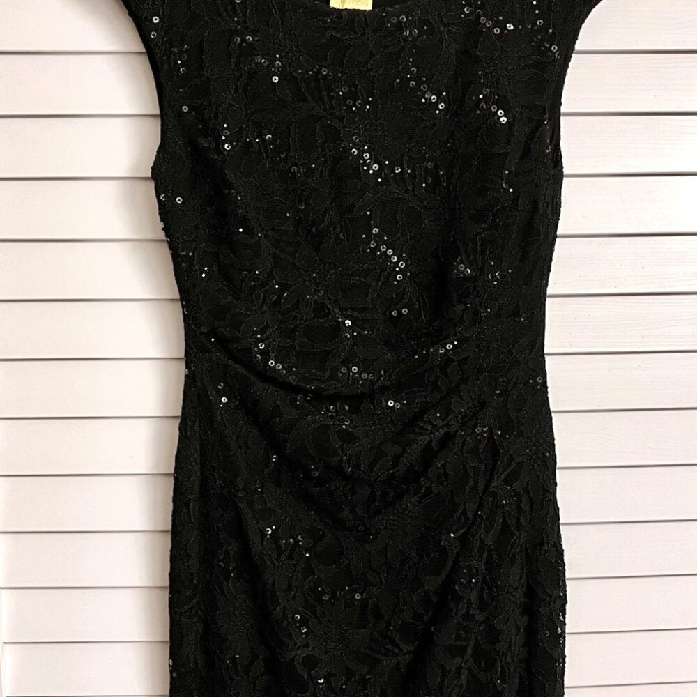 The black dress with suble sparkles Ralph Lauren size 4